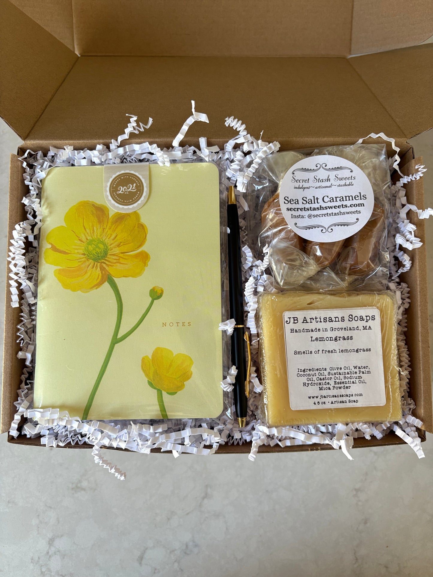 "Hello Sunshine Gift Box with sea salt caramel, buttercup mini notepad and pen, and lemongrass soap bar"