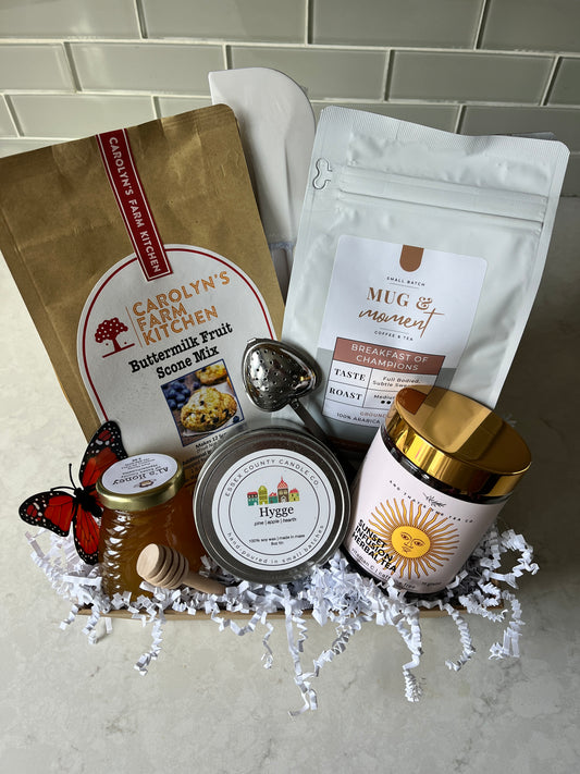 "Good Morning Sunshine Gift Basket with loose leaf tea, honey, tea strainer, coffee, baking kit, spatula, and candle"